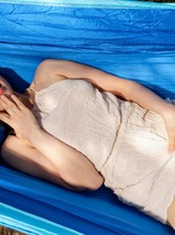 Eveline Angel Enjoys Outdoor Solo Play In The Hammock, Touching Her Perky Boobs And Wet Pussy For An Intense Orgasm - Photo 03