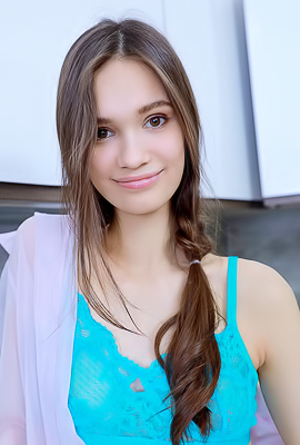 Anastasia Bella Tugs Her Panties Aside For A Glimpse Of Her Shaved Pussy