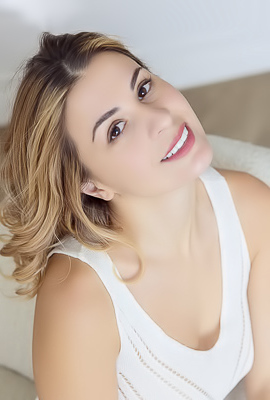 Alice Kelly Dark-eyed Siren Smiles Enticingly As The Straps Slide From Her Shoulders