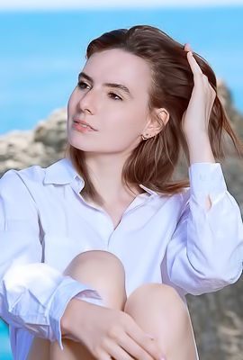 Nika Smiling With Pleasure As The Stimulating Ocean Breeze Caresses Her Sexy Body