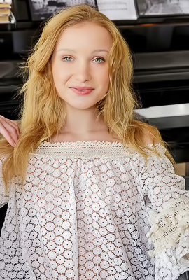 Dana Red With Strawberry-blonde Hair Lounging Naked In An Armchair