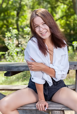 Skye Bloom Perching On A Picnic Table In The Park