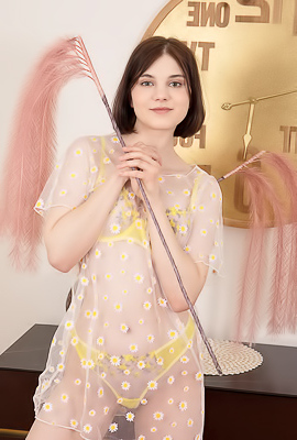 Sara Celeste Bending Over To Show How Her Thong Panties Nestle Between Her Perfect Buns