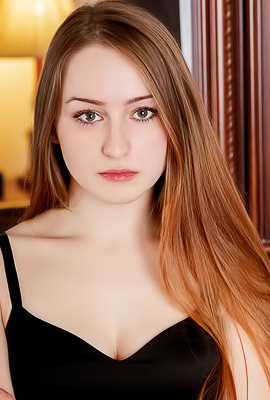 Evelin Her Soft Breasts Bare And Her Mesmerizing Blue Eyes Shining Seductively