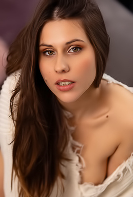 Amber Slassh Teases With Perky Nipples And Spread Legs On The Couch