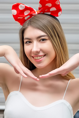 Anfisa playfully caresses herself, giggling against the porcelain